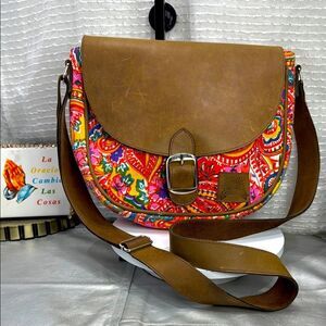 (E4) Sunshine Crossbody BagHandmade in spring leather and floral fabric.